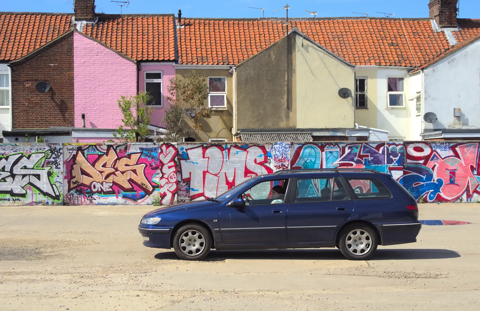 The car sits by Graffiti Wall, from The Dereliction of HMSO, Botolph Street, Norwich - 26th May 2013