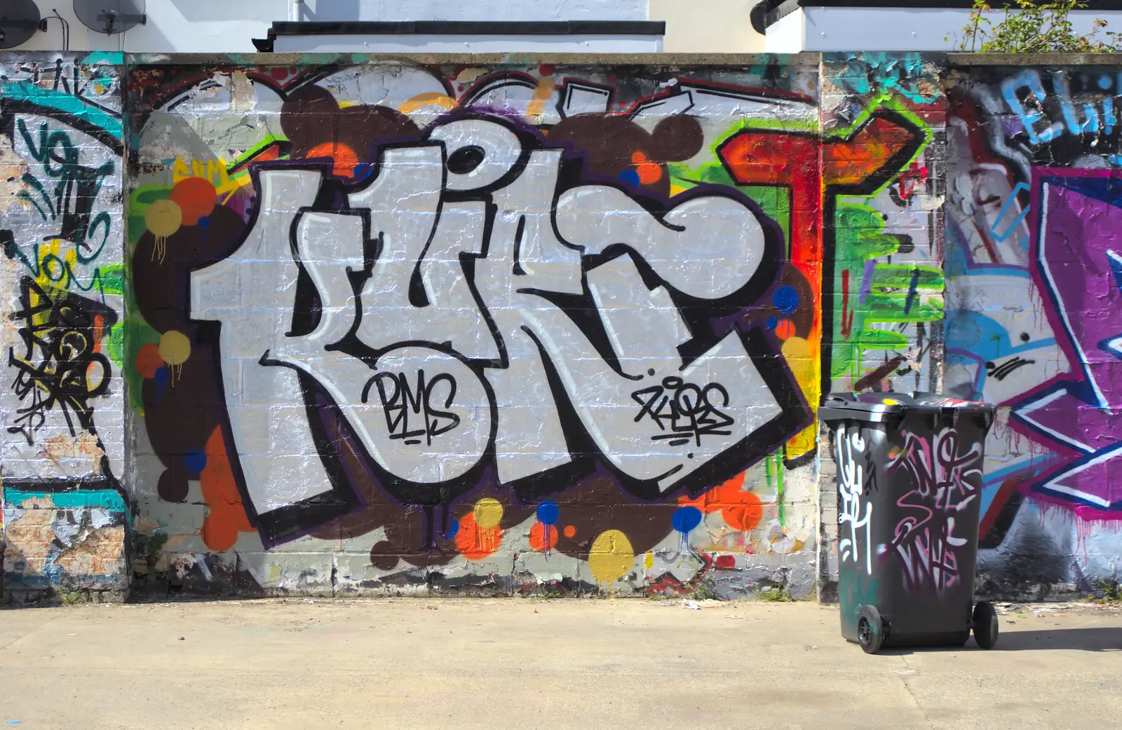 Silver tags and graffiti'd wheelie bins, from The Dereliction of HMSO, Botolph Street, Norwich - 26th May 2013