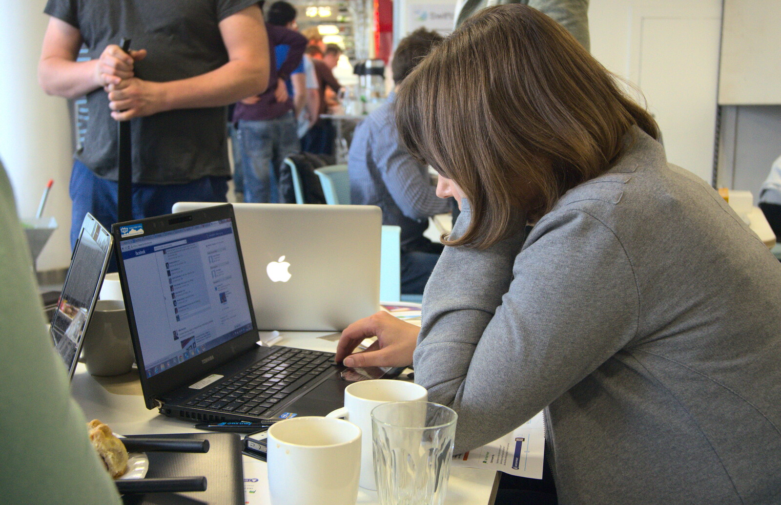 Intently checking Facebook from A SwiftKey Hack Day, Westminster, London - 31st May 2013