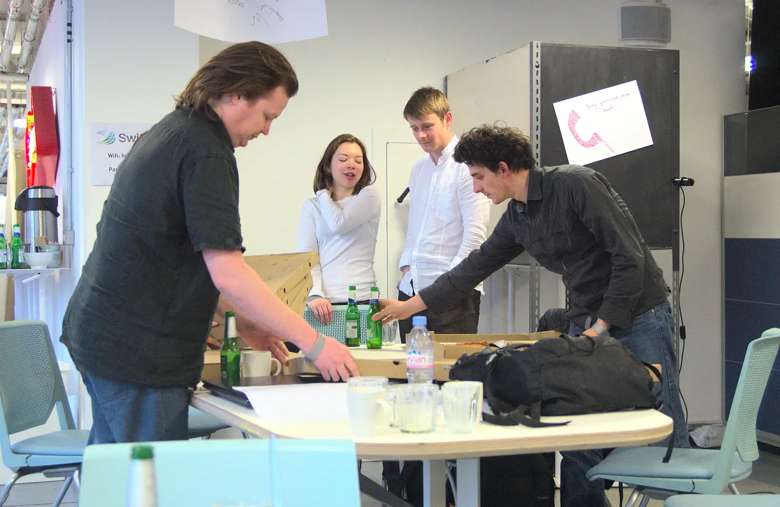 Craig helps to spread out the pizzas, from A SwiftKey Hack Day, Westminster, London - 31st May 2013