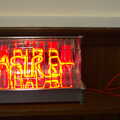 2013 A reclaimed electric fire with a neon tube saying 'fire'