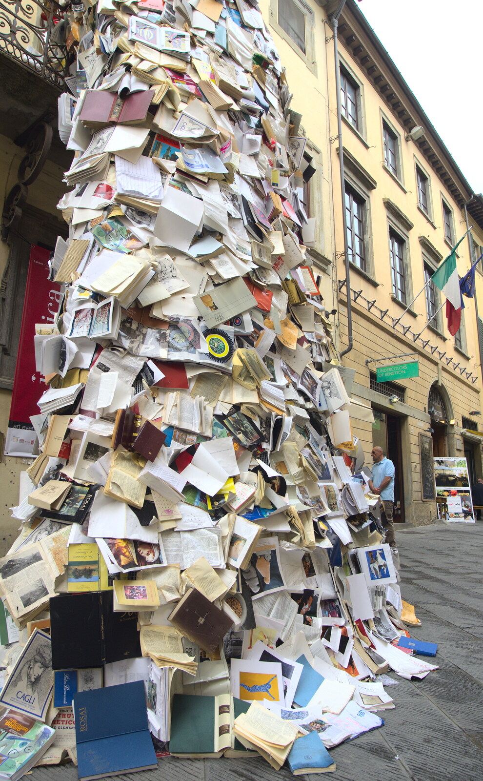 Marconi, Arezzo and the Sagra del Maccherone Festival, Battifolle, Tuscany - 9th June 2013: The pile of books artwork