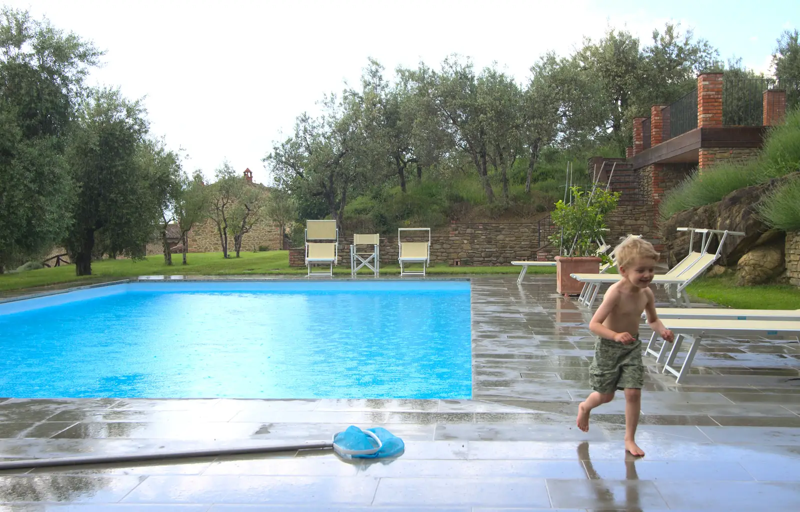 Fred legs it from a sharp rain shower, from Italian Weddings, Saracens and Swimming Pools, Arezzo, Tuscany - 12th June 2013