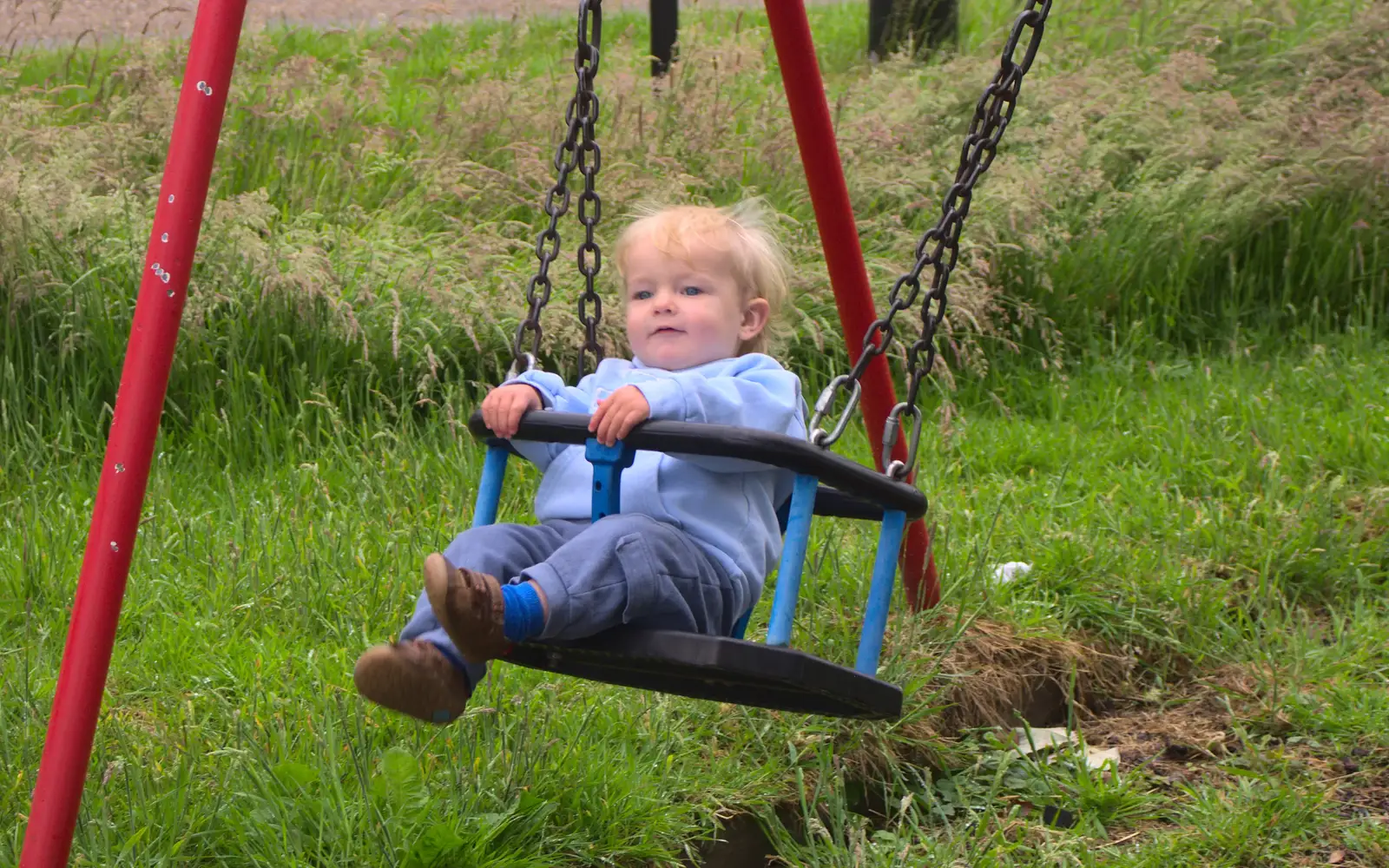 Harry has a swing, from Thrandeston Pig Roast and Tractors, Thrandeston Little Green, Suffolk - 23rd June 2013