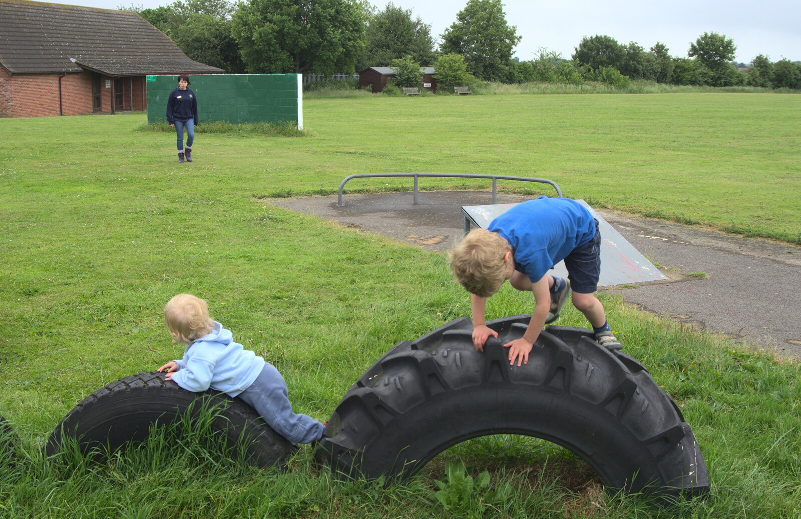 Harry and Fred play on tyres from Thrandeston Pig Roast and Tractors, Thrandeston Little Green, Suffolk - 23rd June 2013
