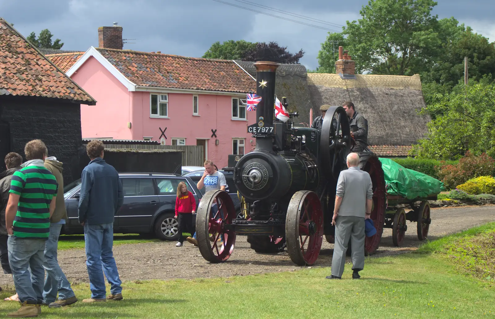 Grandad gets a close up of Oliver, from Thrandeston Pig Roast and Tractors, Thrandeston Little Green, Suffolk - 23rd June 2013