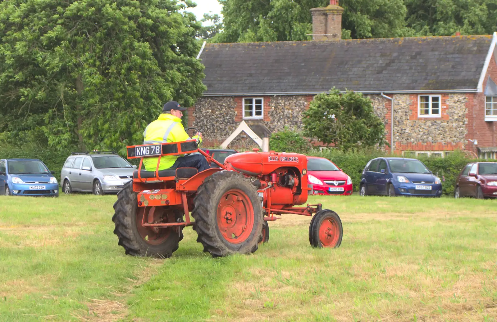 The first vintage tractor arrives, from Thrandeston Pig Roast and Tractors, Thrandeston Little Green, Suffolk - 23rd June 2013