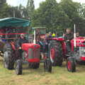 More tractors line up in the rain, Thrandeston Pig Roast and Tractors, Thrandeston Little Green, Suffolk - 23rd June 2013