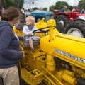 Harry on a Massey-Ferguson 35X, Thrandeston Pig Roast and Tractors, Thrandeston Little Green, Suffolk - 23rd June 2013