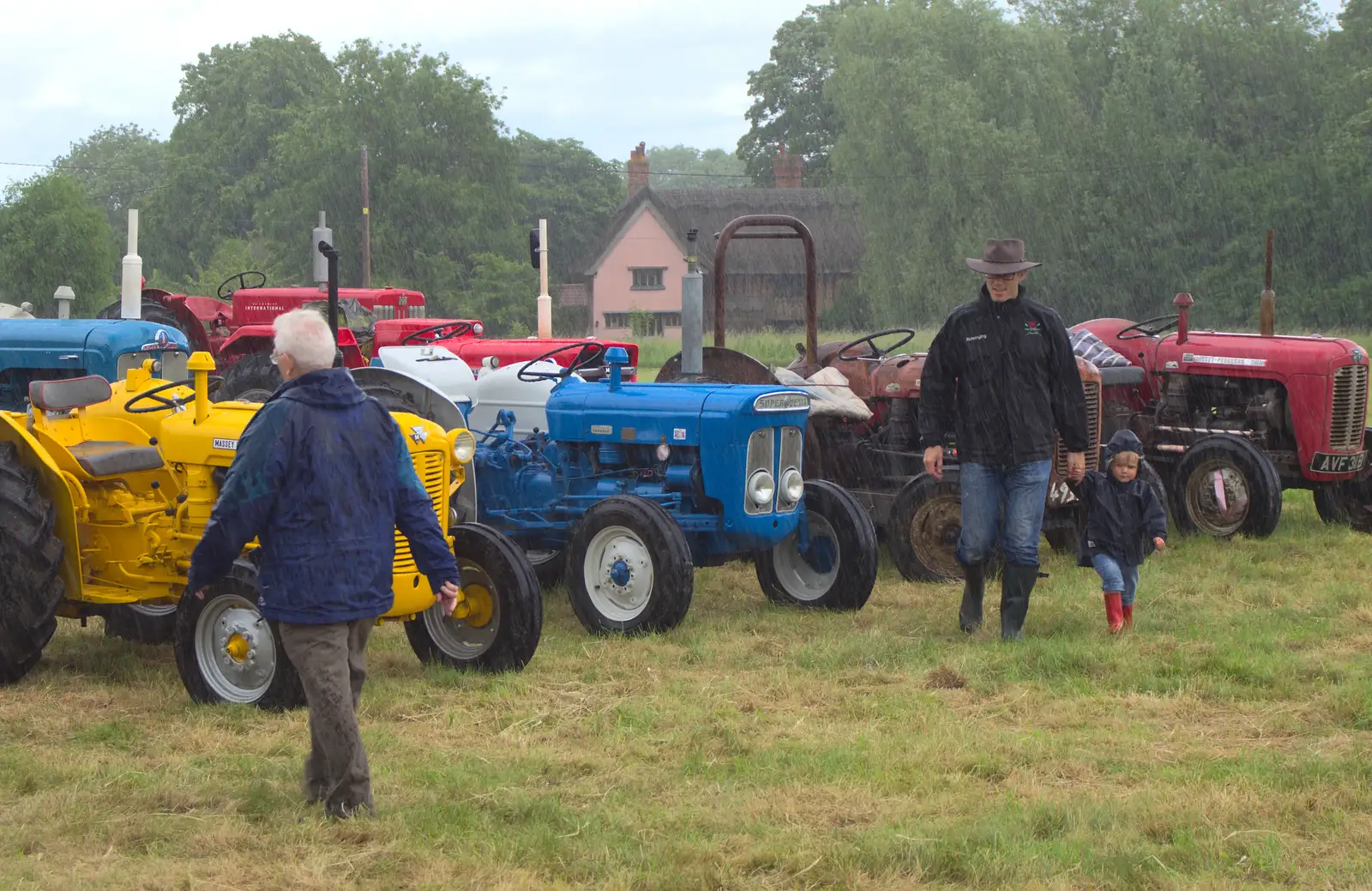 Rain lashes down during one of the showers, from Thrandeston Pig Roast and Tractors, Thrandeston Little Green, Suffolk - 23rd June 2013