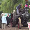 A small dog perches on the wheels of the engine, Thrandeston Pig Roast and Tractors, Thrandeston Little Green, Suffolk - 23rd June 2013