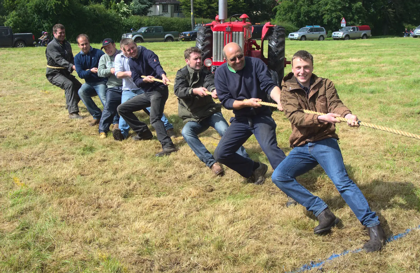 A tug-of-war kicks off, from Thrandeston Pig Roast and Tractors, Thrandeston Little Green, Suffolk - 23rd June 2013