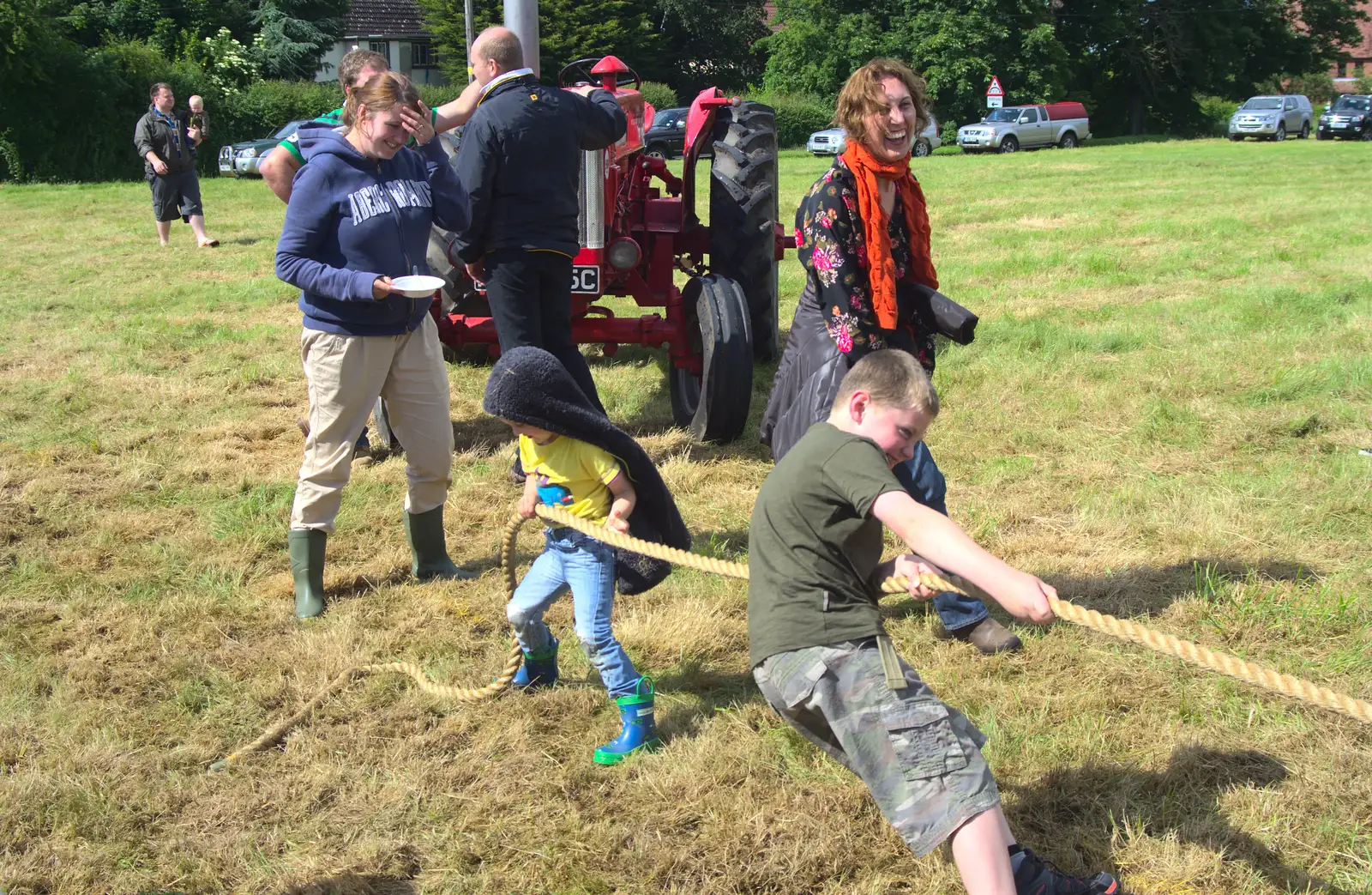 Fred and Matthew pull on a rope, from Thrandeston Pig Roast and Tractors, Thrandeston Little Green, Suffolk - 23rd June 2013