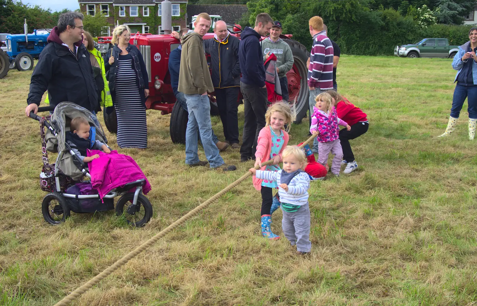 Harry helps out with the children's event, from Thrandeston Pig Roast and Tractors, Thrandeston Little Green, Suffolk - 23rd June 2013