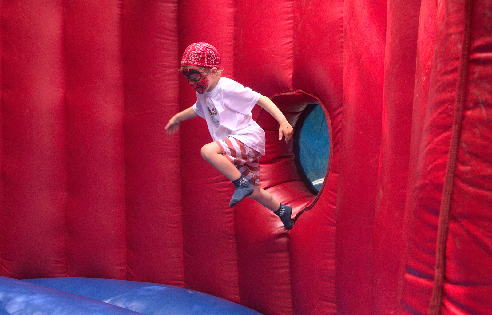 Fred leaps around on a bouncy castle from Marconi's Demolition and Brome Village Fete, Chelmsford and Brome, Suffolk - 6th July 2013