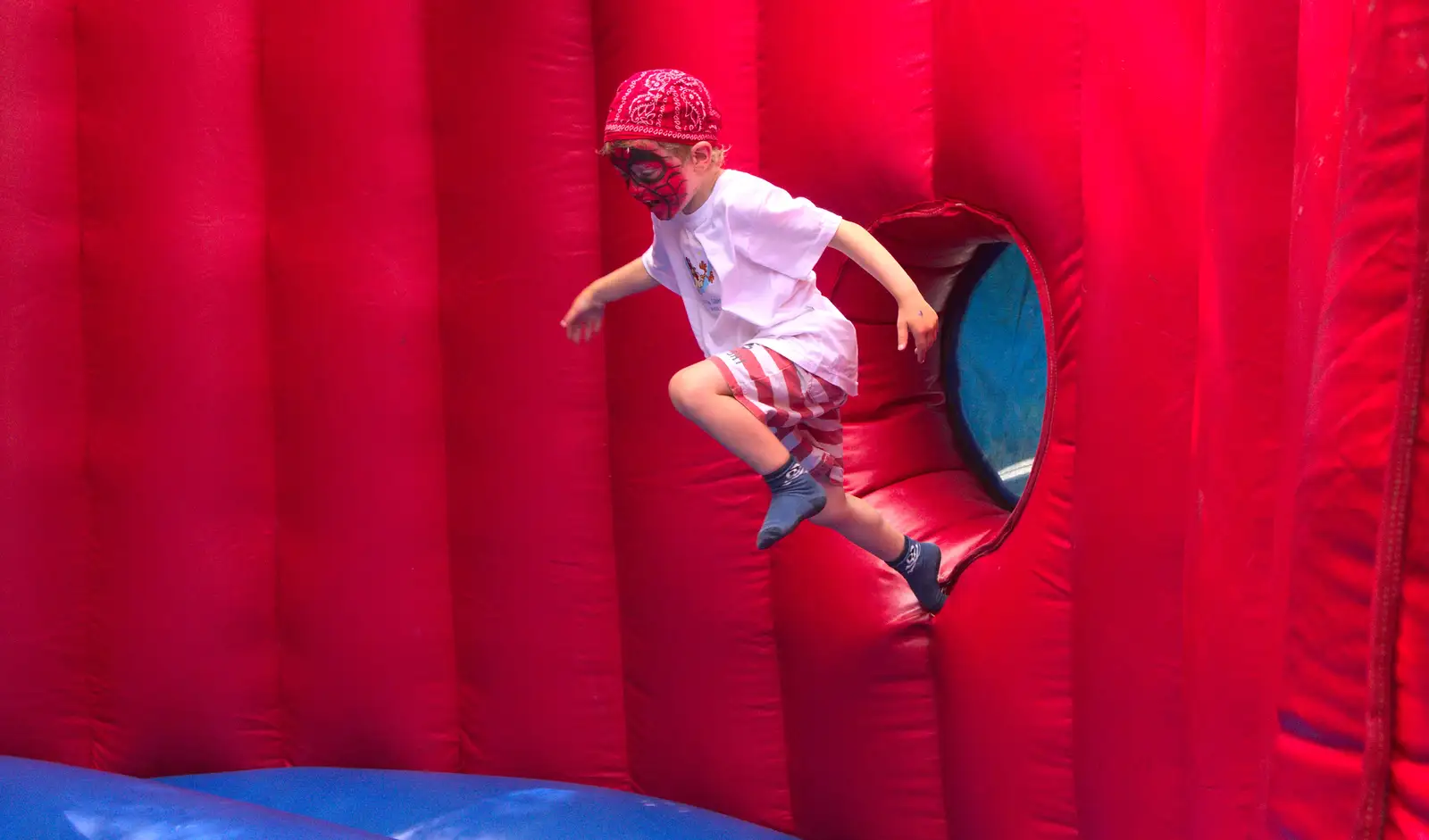 Fred leaps around on a bouncy castle, from Marconi's Demolition and Brome Village Fete, Chelmsford and Brome, Suffolk - 6th July 2013