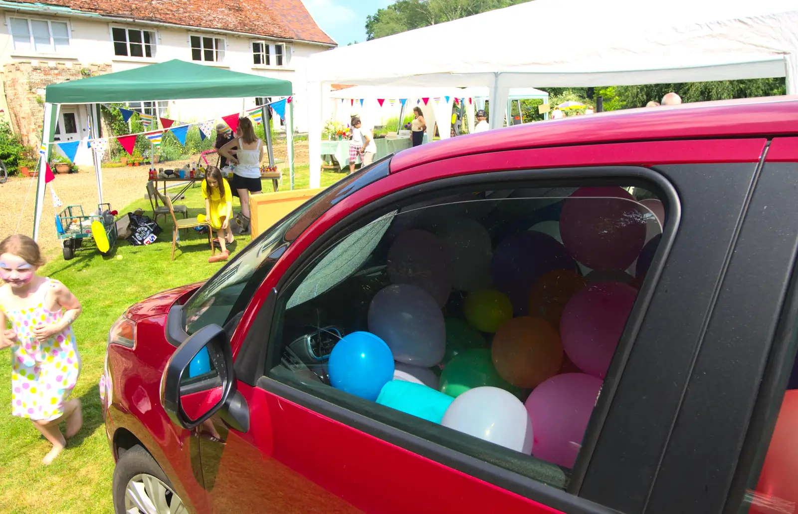 There's a car full of balloons, from Marconi's Demolition and Brome Village Fete, Chelmsford and Brome, Suffolk - 6th July 2013