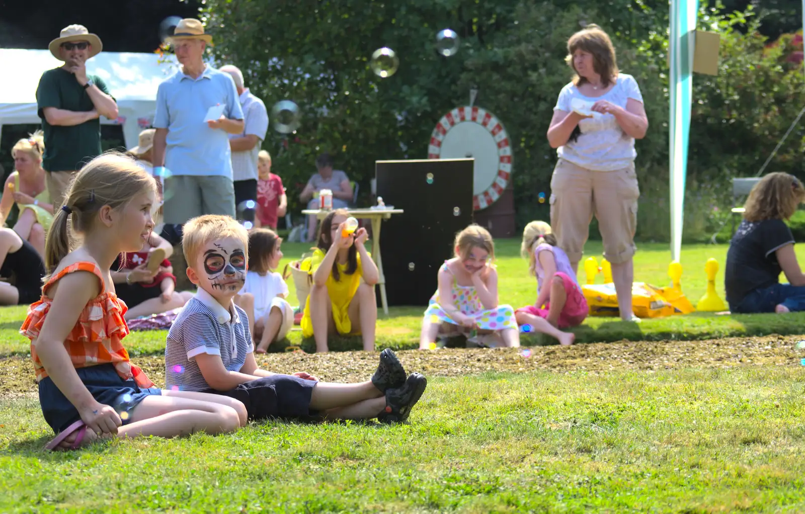 A small boy in face paint looks a bit folorn, from Marconi's Demolition and Brome Village Fete, Chelmsford and Brome, Suffolk - 6th July 2013