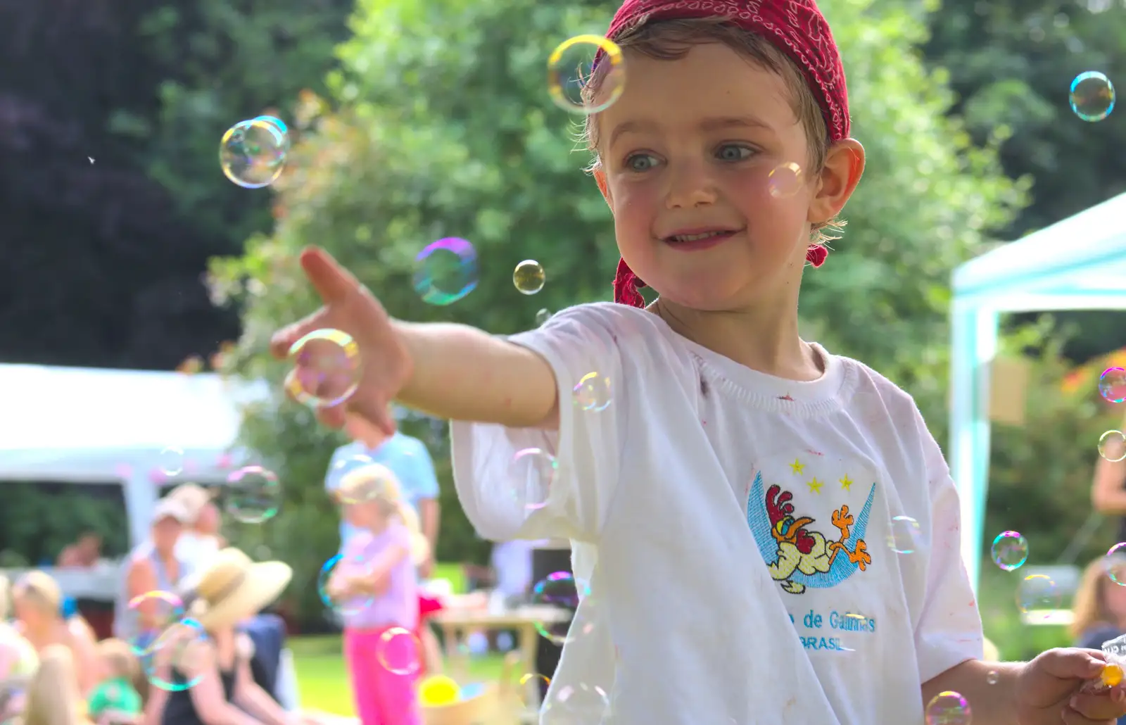 Fred chases bubbles, from Marconi's Demolition and Brome Village Fete, Chelmsford and Brome, Suffolk - 6th July 2013