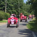 The first pink tractors rumble down the lane, The "Pink Ladies" Tractor Run and Barbeque, Thorpe Abbots, Norfolk - 7th July 2013