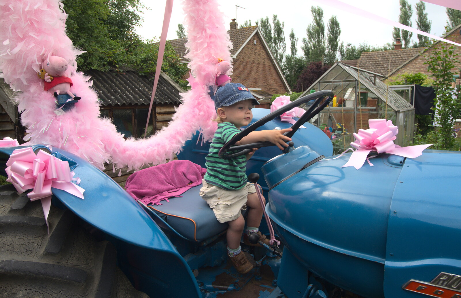 Harry on a pink tractor from The BSCC at Pulham Crown, and Grandad with a Grinder, Brome, Suffolk - 11th July 2013