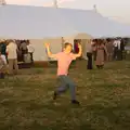 A small boy runs past and leaps in to the air, The BBs Play Steph's Wedding, Burston, Norfolk - 13th July 2013