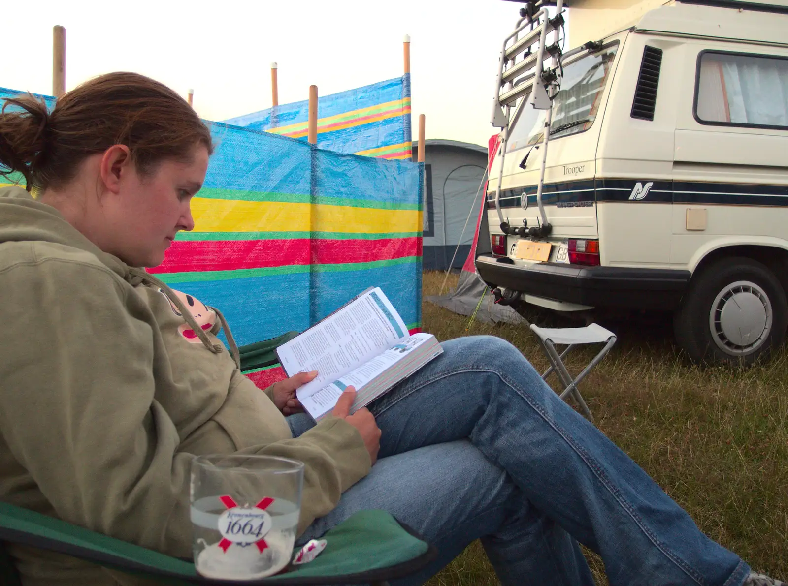 Isobel reads the programme, from The 8th Latitude Festival, Henham Park, Southwold, Suffolk - 18th July 2013