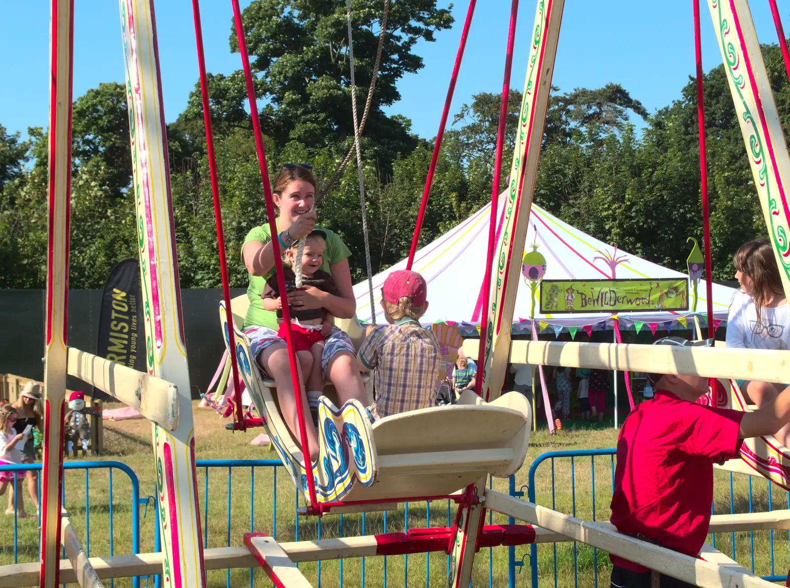 Isobel, Harry and Fred ride on the swing boats, from The 8th Latitude Festival, Henham Park, Southwold, Suffolk - 18th July 2013