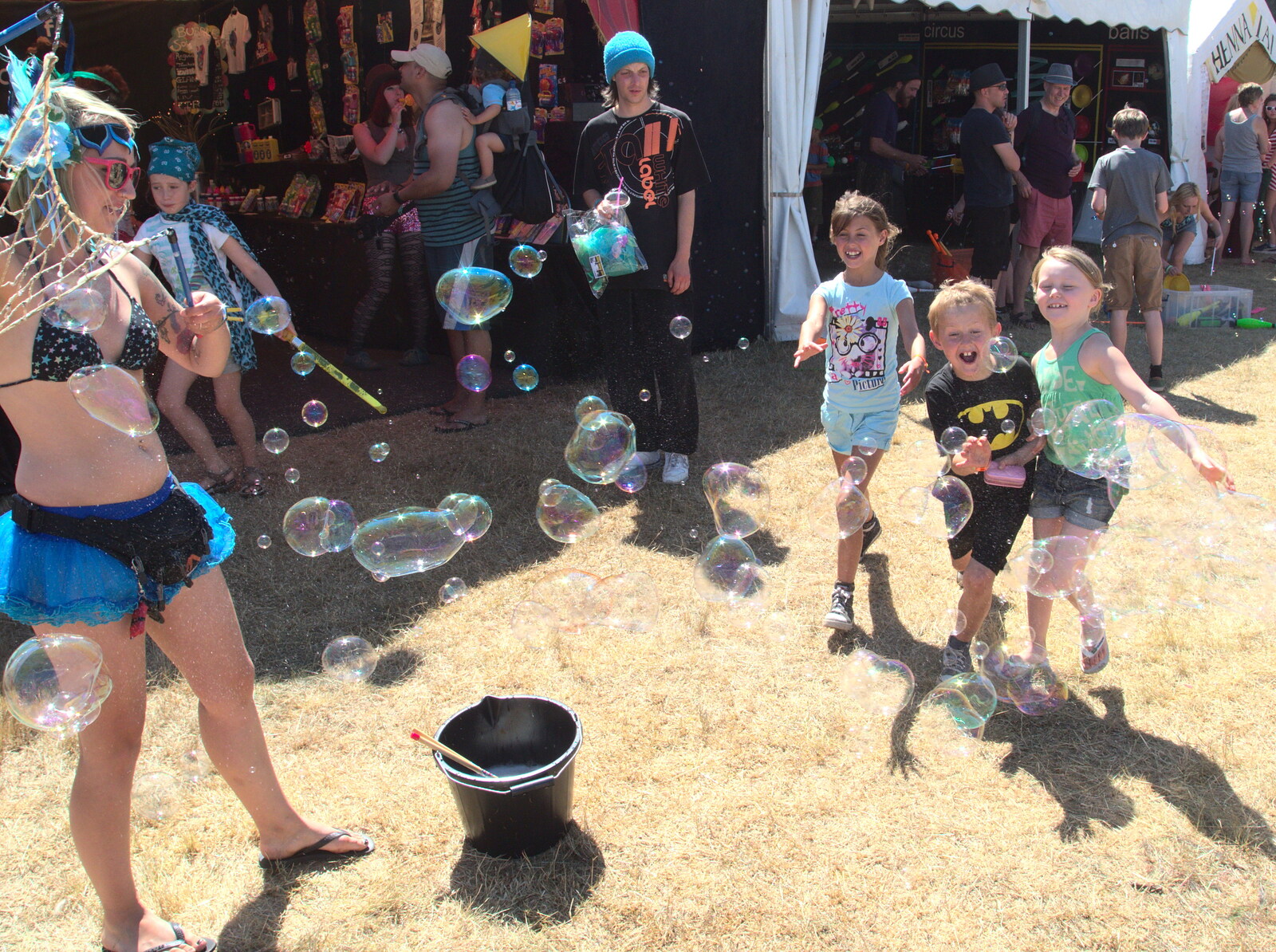 A bunch of children watch bubbles from The 8th Latitude Festival, Henham Park, Southwold, Suffolk - 18th July 2013