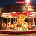 A girl watches the merry-go-round, The 8th Latitude Festival, Henham Park, Southwold, Suffolk - 18th July 2013