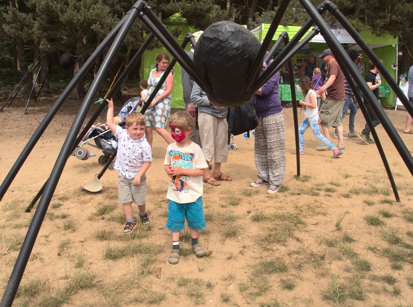 Fred under a giant spider from The 8th Latitude Festival, Henham Park, Southwold, Suffolk - 18th July 2013