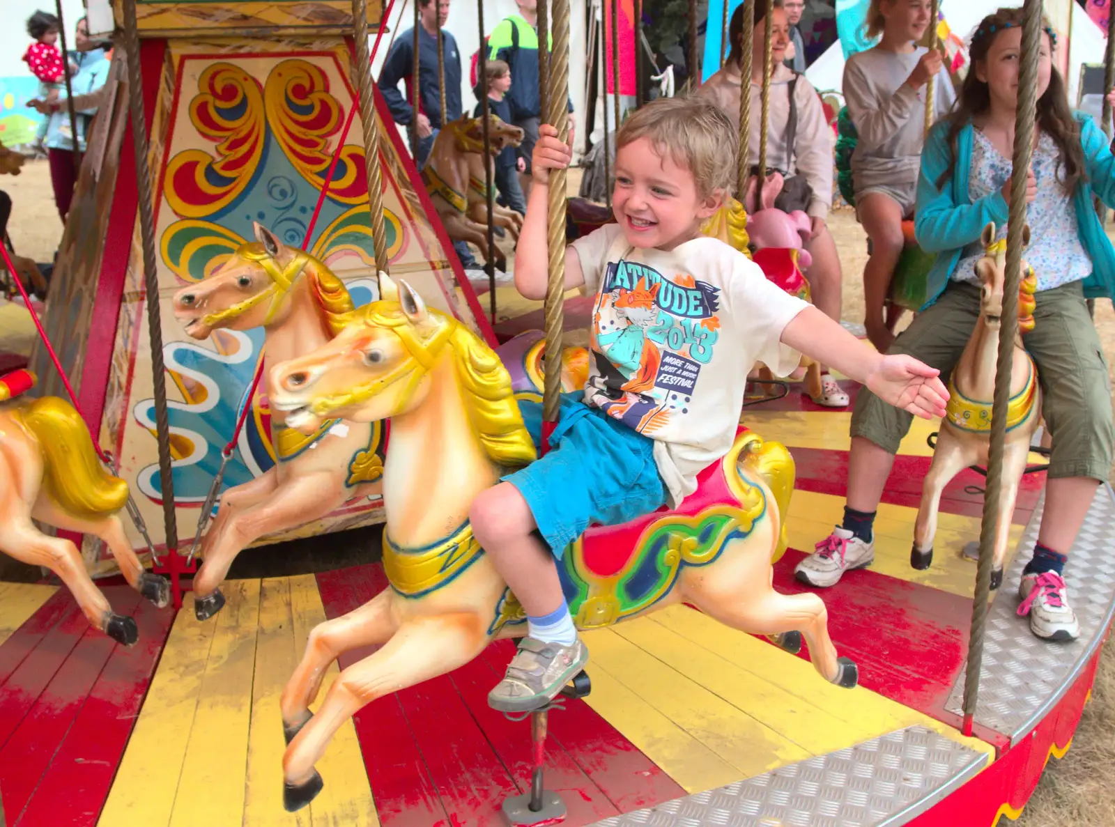 Fred on the gallopers, from The 8th Latitude Festival, Henham Park, Southwold, Suffolk - 18th July 2013