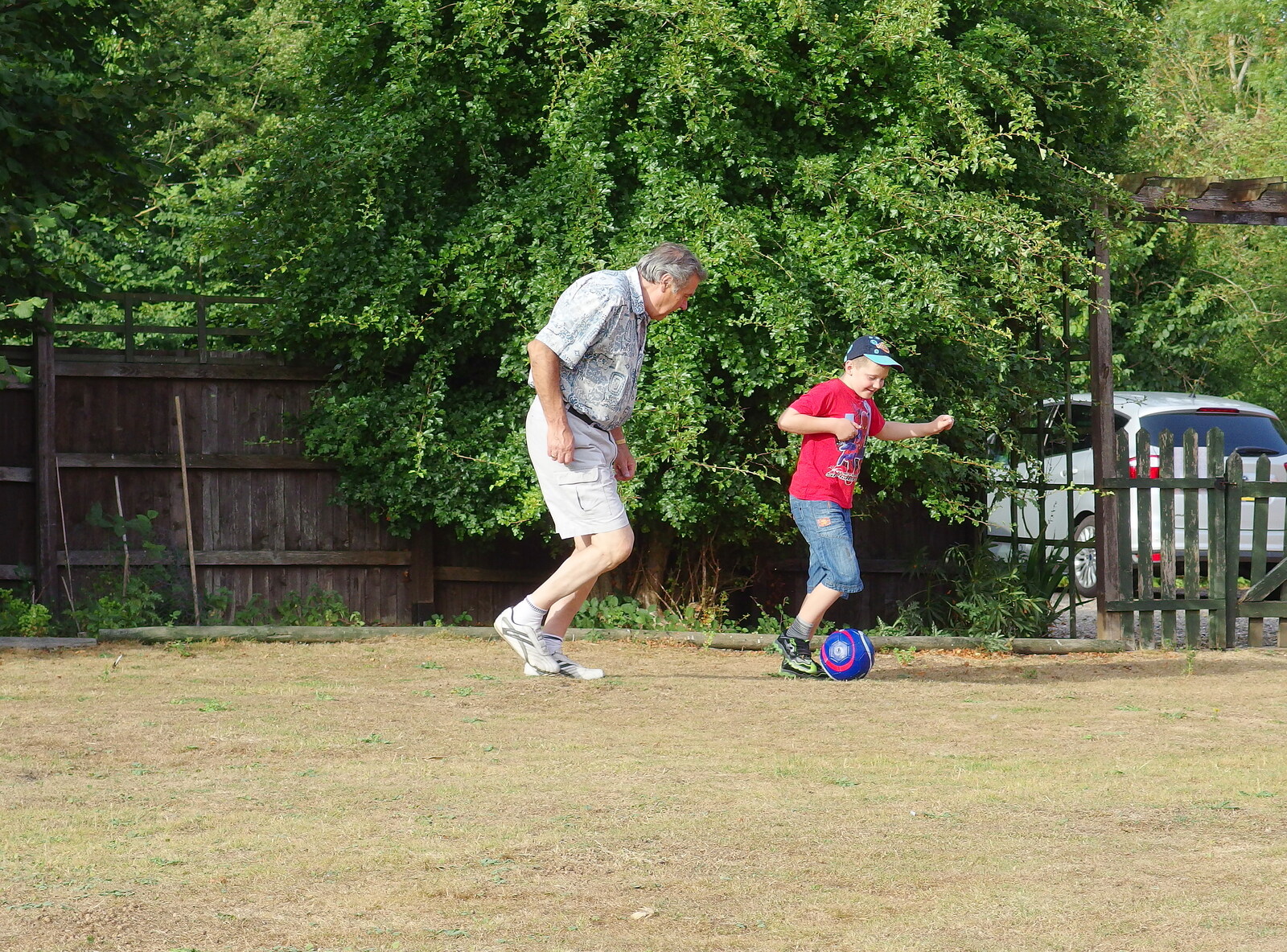 Alan and Matthew play football from The BSCC at Walpole, and a Swan Inn Barbeque, Brome, Suffolk - 4th August 2013