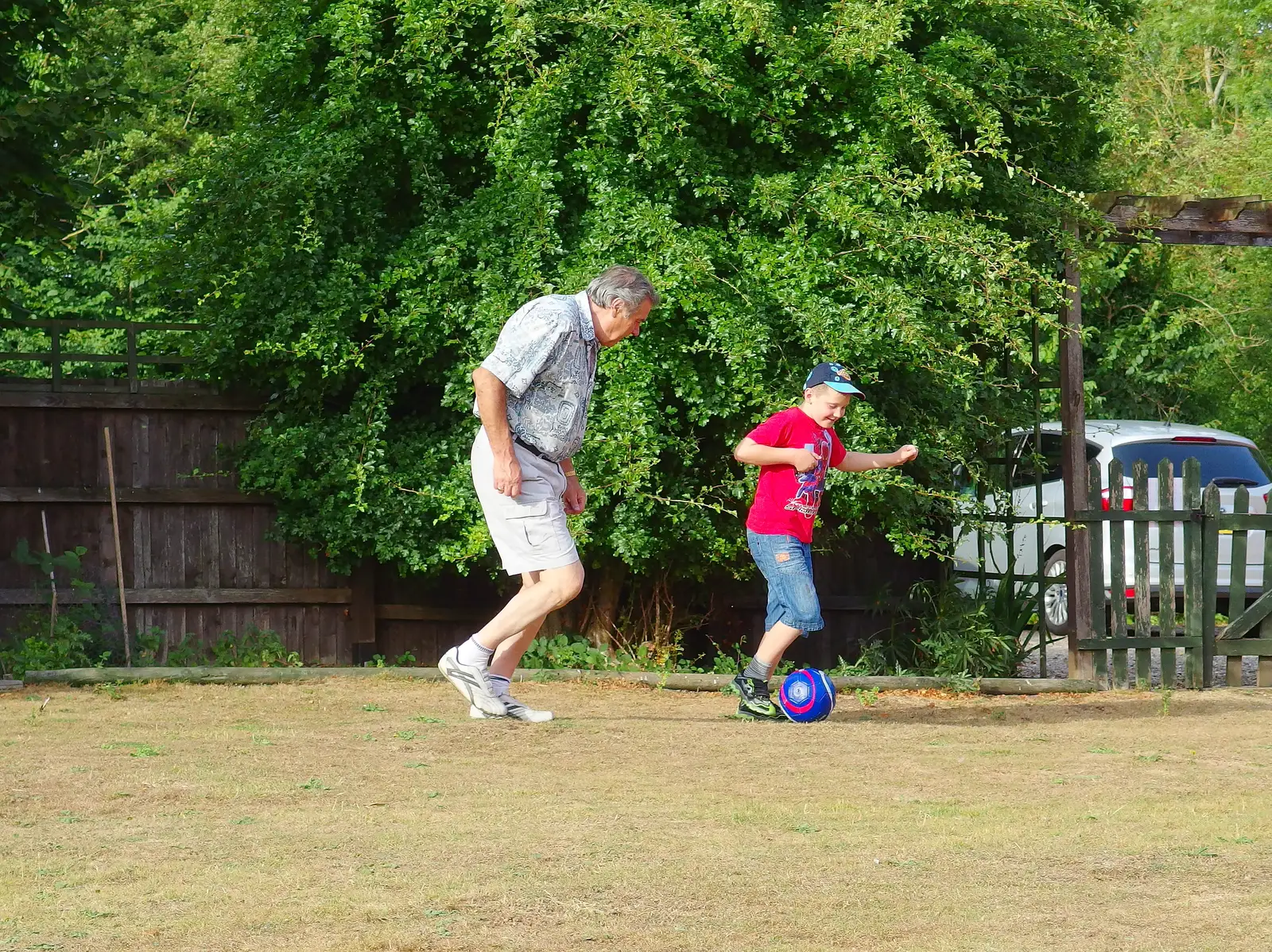 Alan and Matthew play football, from The BSCC at Wingfield, and a Swan Inn Barbeque, Brome - 4th August 2013