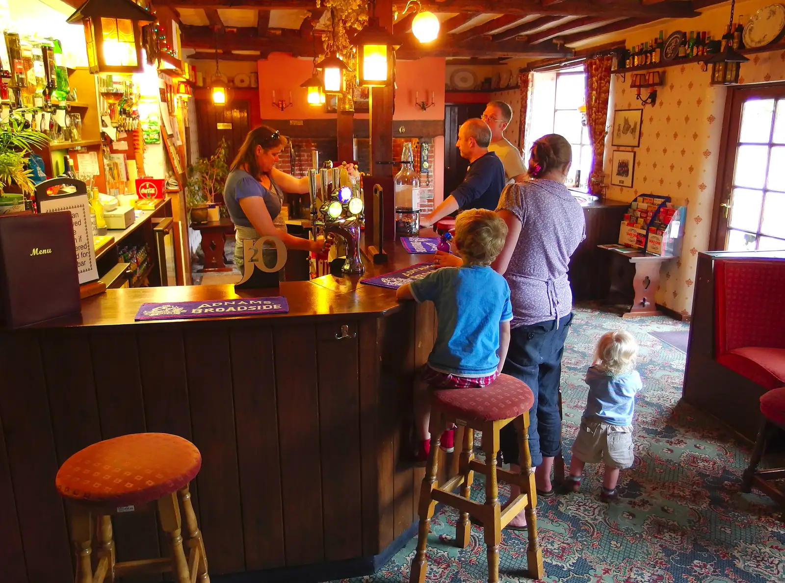 Claire pulls a pint as Fred waits at the bar, from The BSCC at Wingfield, and a Swan Inn Barbeque, Brome - 4th August 2013