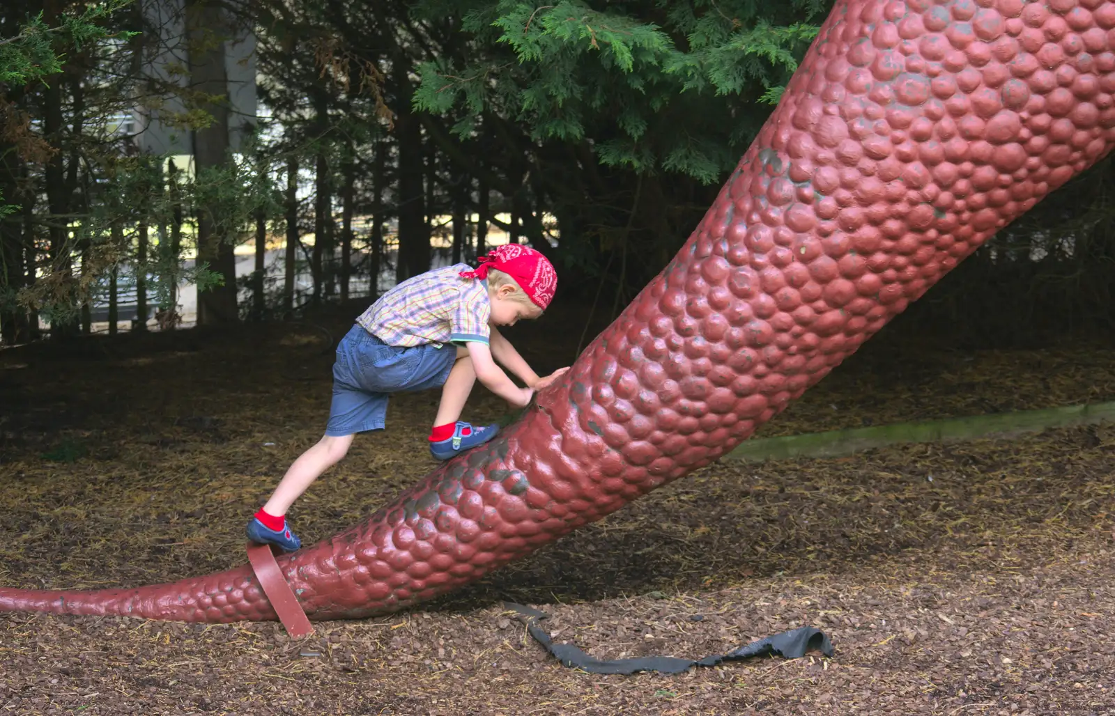 Fred climbs up the tail of a Tyrannosaurus Rex, from Tiger Cubs at Banham Zoo, Banham, Norfolk - 6th August 2013