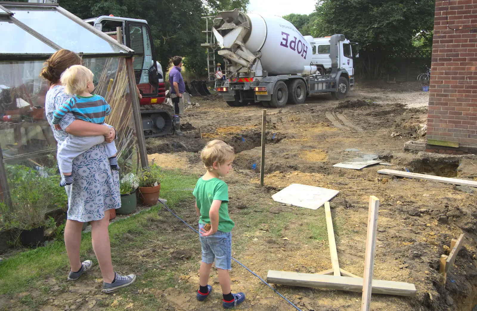 Isobel, Harry and Fred watch, from Grand Designs: Building Commences, Brome, Suffolk - 8th August 2013