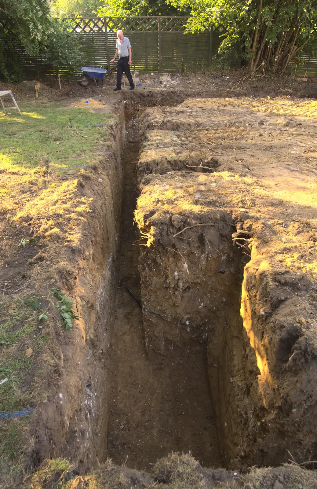 Grandad by the ridiculously-deep garage footings, from Grand Designs: Building Commences, Brome, Suffolk - 8th August 2013