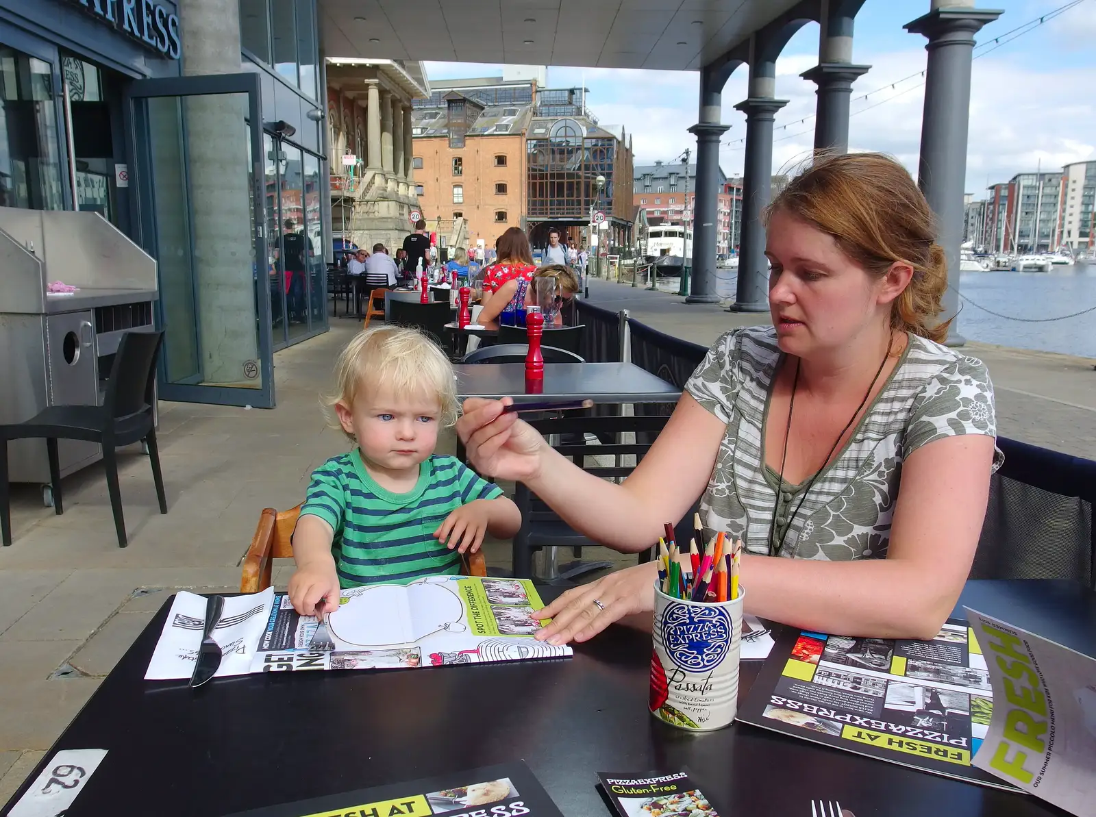 Harry gets his colouring equipment, from A Trip to Pizza Express, Nepture Quay, Ipswich, Suffolk - 9th August 2013