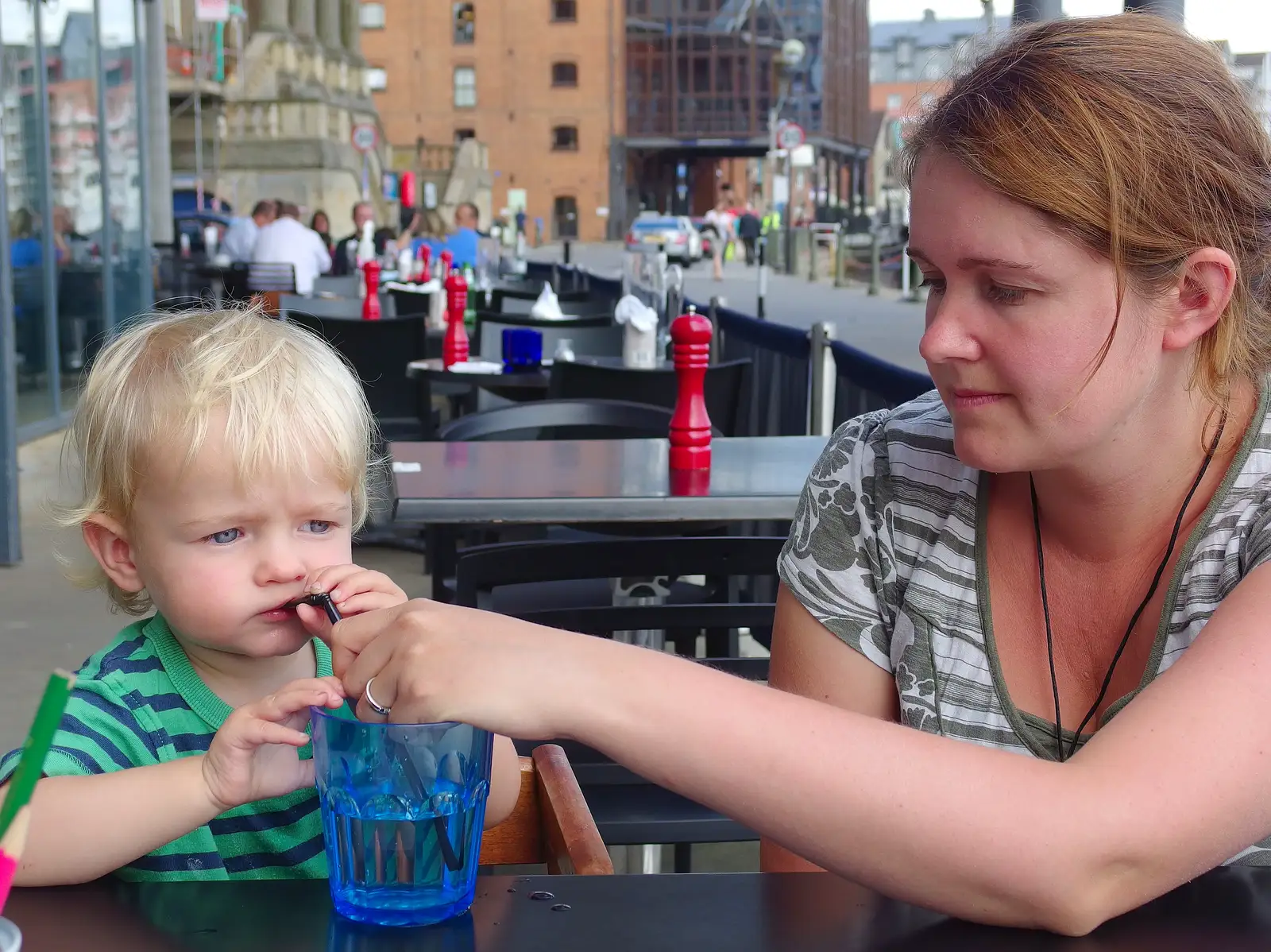 Harry slurps on a straw, from A Trip to Pizza Express, Nepture Quay, Ipswich, Suffolk - 9th August 2013