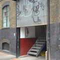 A graffitoed roller shutter, Spitalfields and Brick Lane Street Art, Whitechapel, London - 10th August 2013