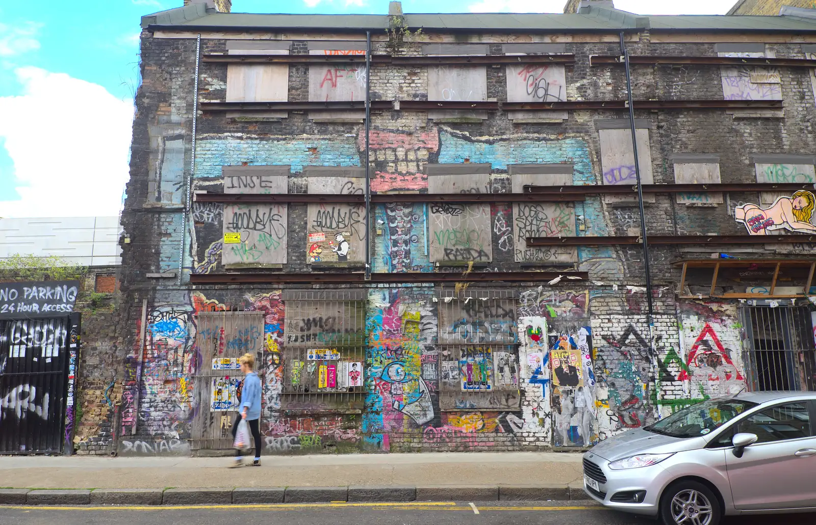 A derelict boarded-up building, from Spitalfields and Brick Lane Street Art, Whitechapel, London - 10th August 2013