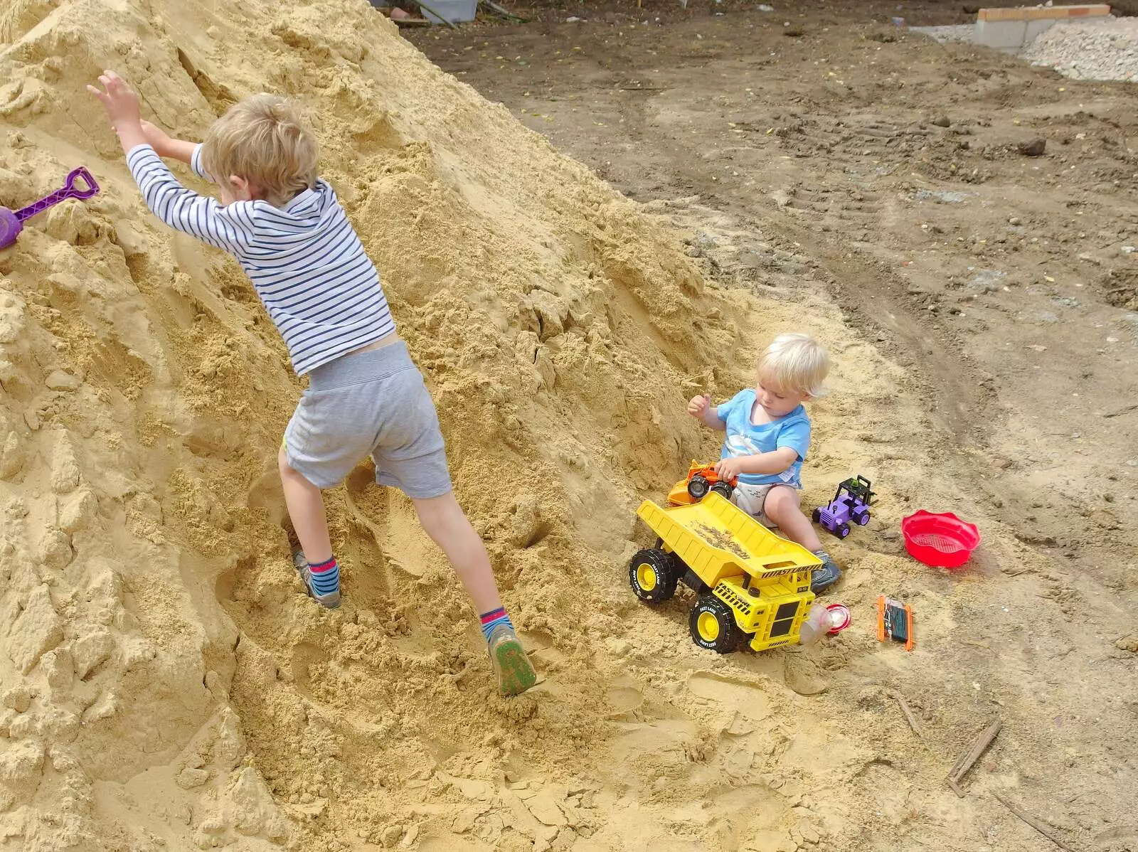 Fred in the sand pile, from A Giant Sand Pile, and a Walk at Thornham, Suffolk - 17th August 2013