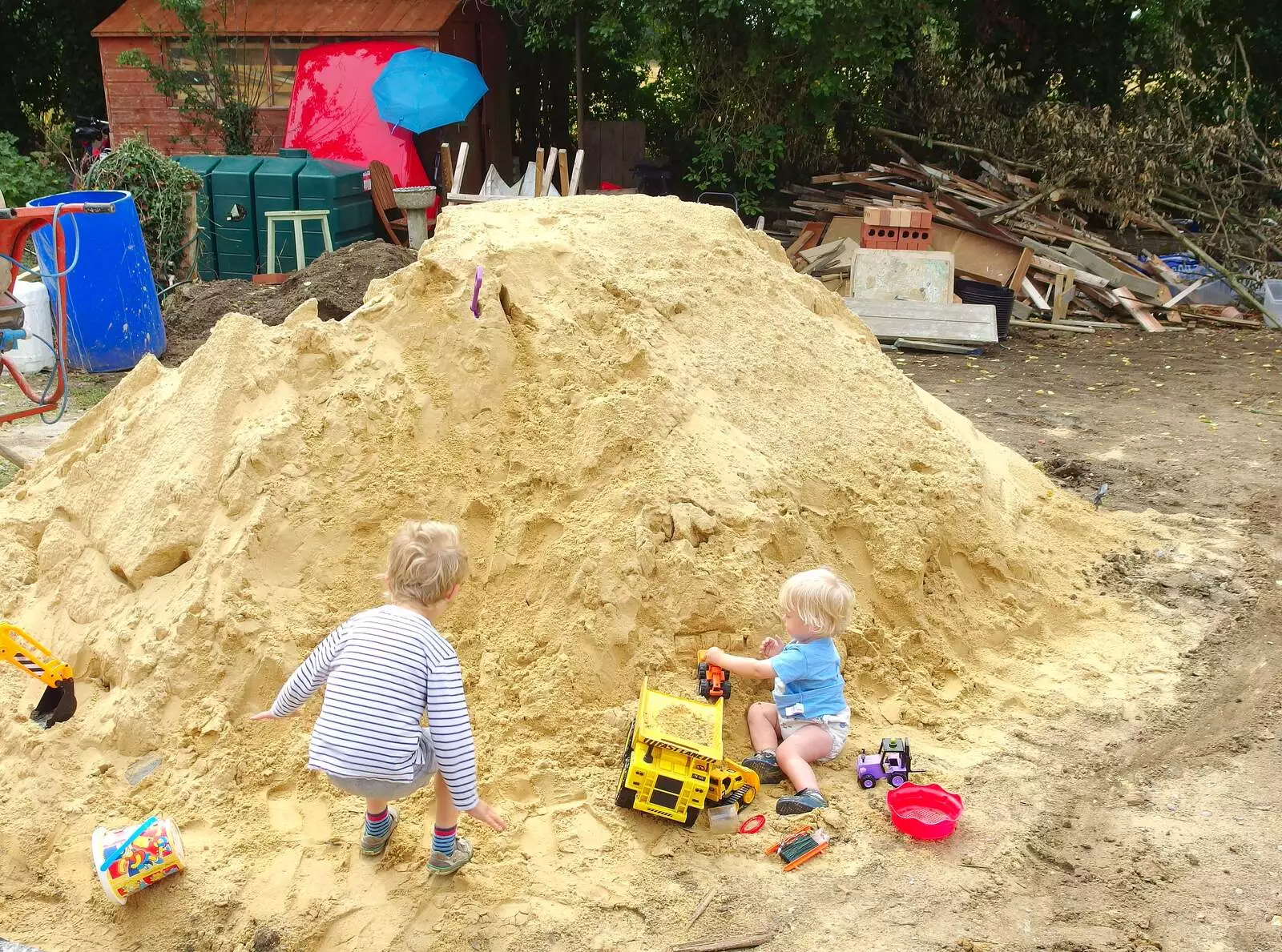 The boys and their big sand pile, from A Giant Sand Pile, and a Walk at Thornham, Suffolk - 17th August 2013