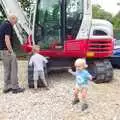 Harry looks cheeky as Grandad and Fred inspect, A Giant Sand Pile, and a Walk at Thornham, Suffolk - 17th August 2013