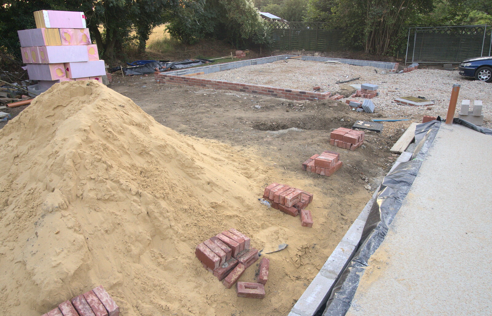 Bricks appear near the pile of sand from Bressingham Gardens, and Building Progress, Brome, Suffolk - 26th August 2013
