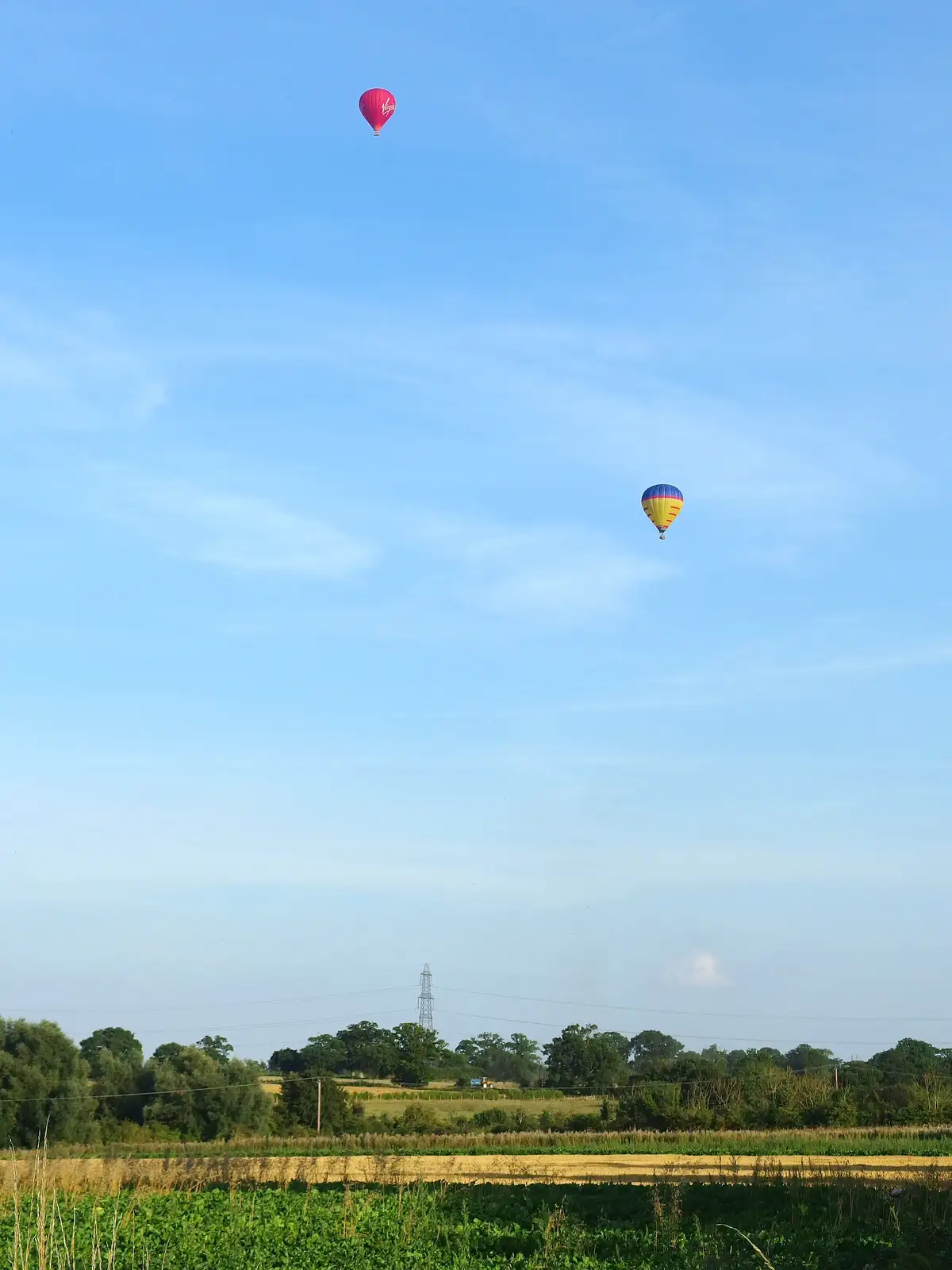 Two balloons float over Thrandeston, from Pigeon-Eating Hawks and the Mellis Beer Festival, London and Suffolk - 31st August 2013