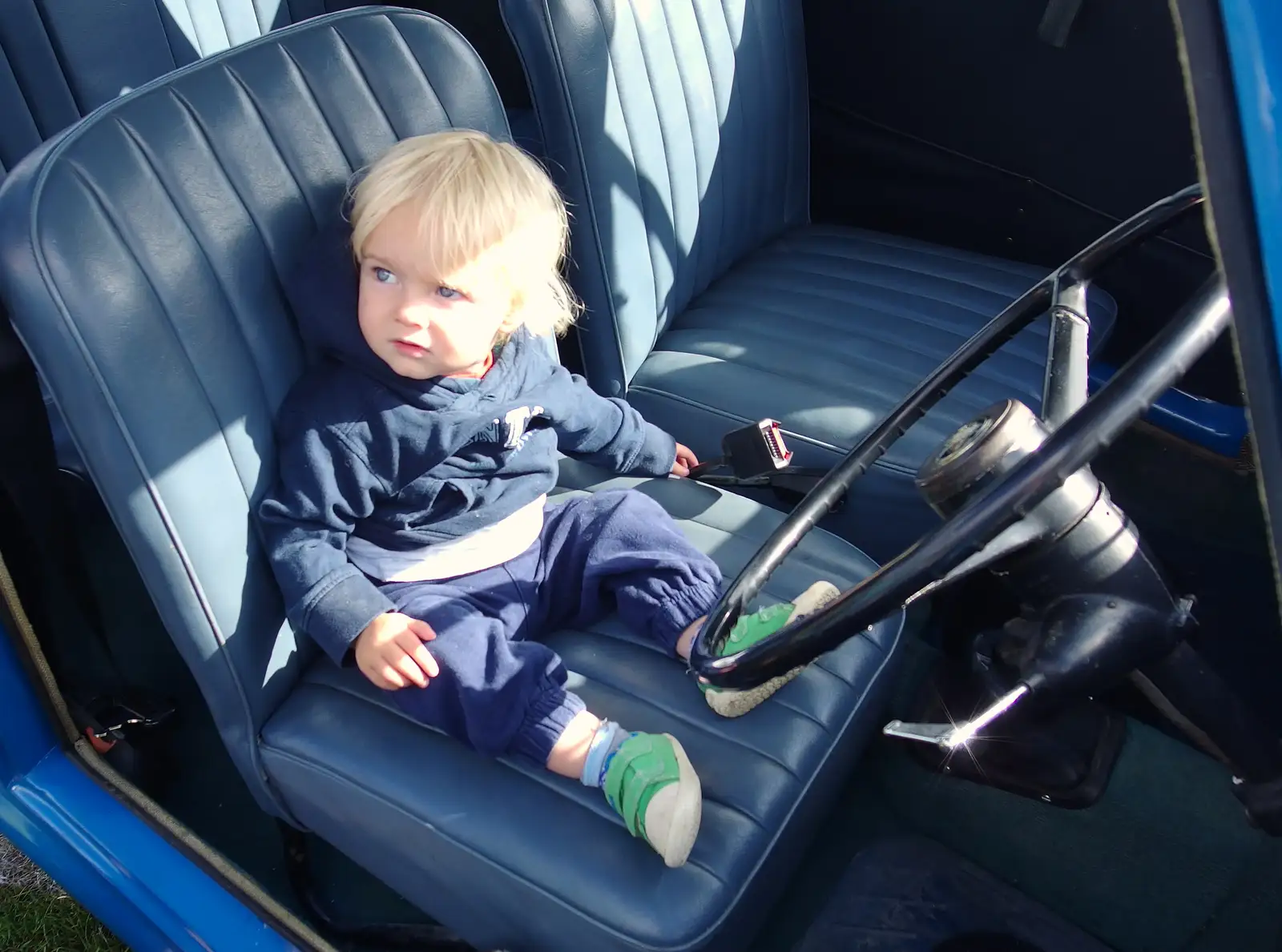 Harry sits in an Austin A35, from Stradbroke Classic Car Show, Stradbroke, Suffolk - 7th September 2013