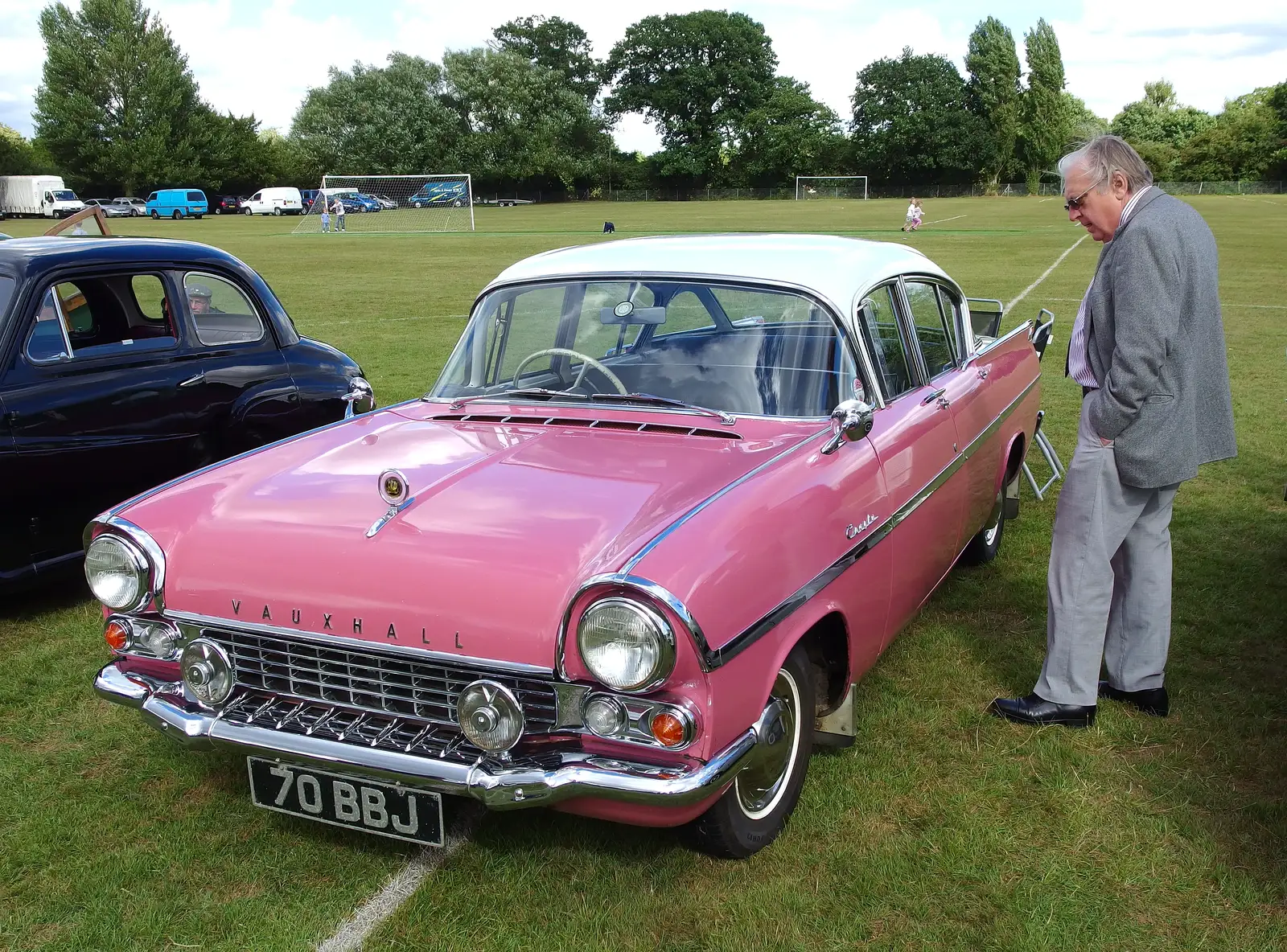 A pink 1950s Vauxhall is inspected, from Stradbroke Classic Car Show, Stradbroke, Suffolk - 7th September 2013