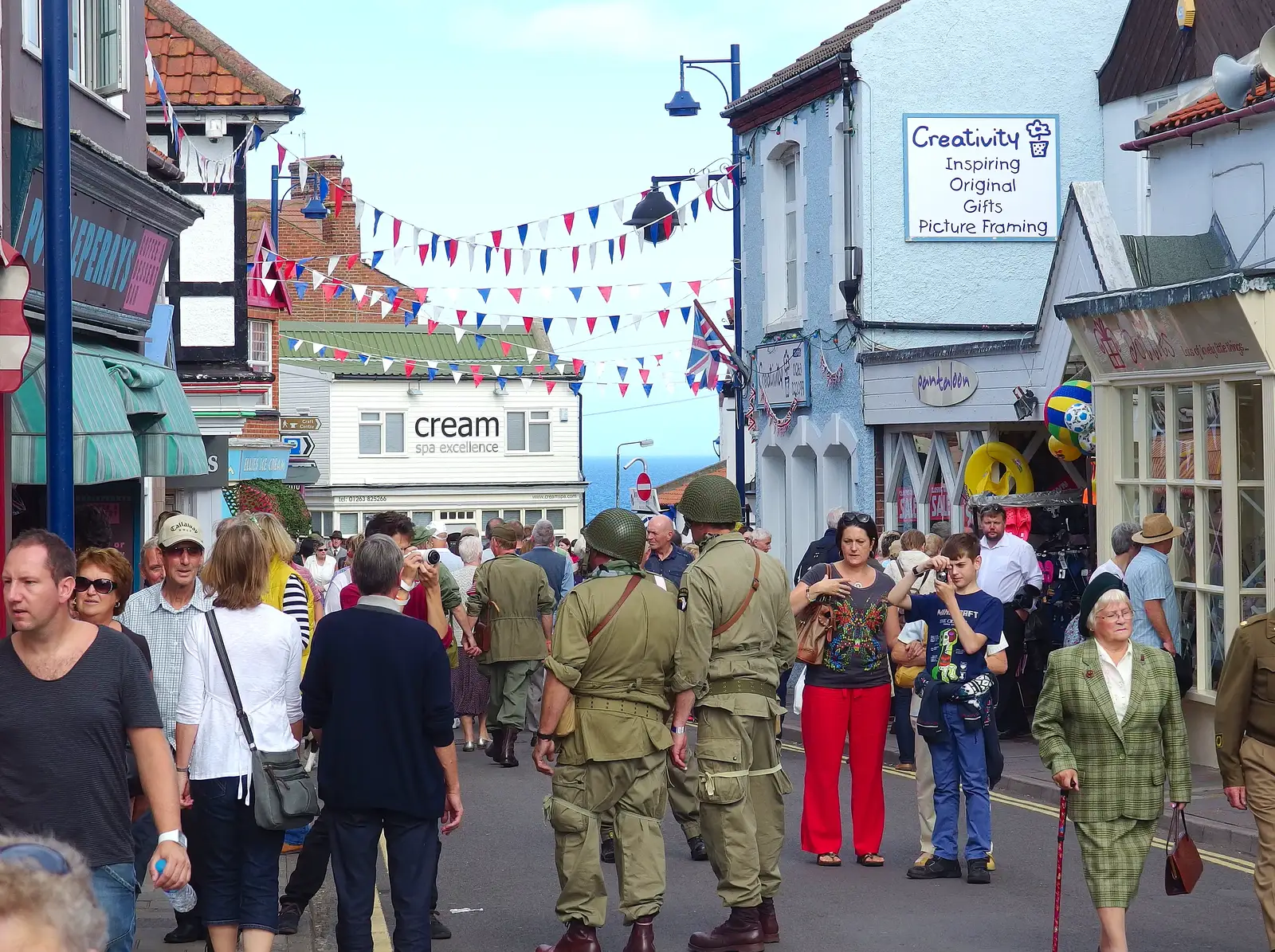 GIs roam around Sheringham, from Paul Bear's Adventures at a 1940s Steam Weekend, Holt, Norfolk - 22nd September 2013